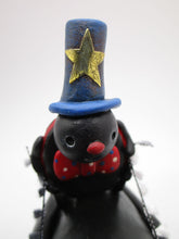 Americana 4th of July crow with lady bug rider