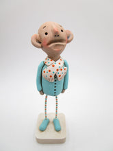 Wacky character "anguish" man in teal and orange