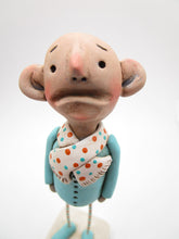 Wacky character "anguish" man in teal and orange