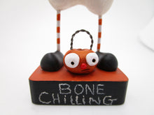 Halloween BONE CHILLING character with spider and pumpkin bucket