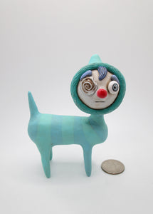 Art character four legged creature with red nose and eye swirl- monster ?