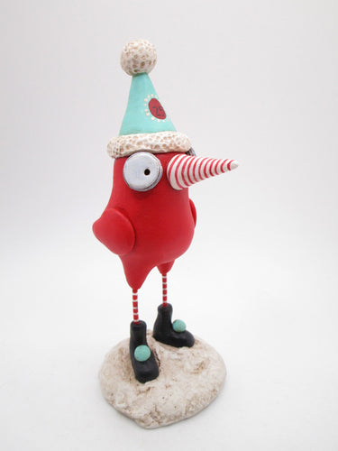 Christmas folk art red bird with peppermint stripped beak