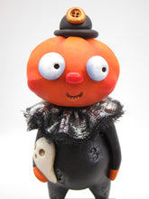 Halloween folk art pumpkin man with fancy shimmering collar