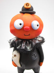 Halloween folk art pumpkin man with fancy shimmering collar