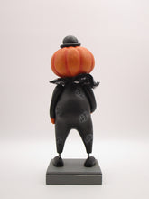 Halloween folk art pumpkin man with fancy shimmering collar