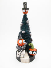Halloween bottle brush tree with pumpkins and gifts