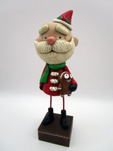 Christmas folk art Santa Claus and his gingerbread man stuffy