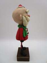 Christmas folk art Santa Claus and his gingerbread man stuffy
