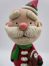 Christmas folk art Santa Claus and his gingerbread man stuffy