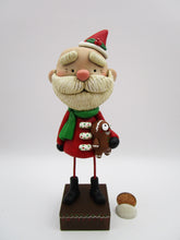 Christmas folk art Santa Claus and his gingerbread man stuffy