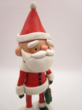 Christmas traditional Santa in red with sculpted wreath charm