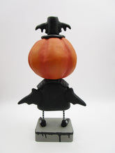 Halloween folk art spooky Pumpkin wearing bat costume