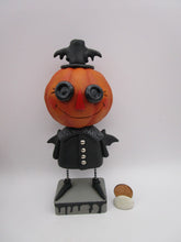 Halloween folk art spooky Pumpkin wearing bat costume