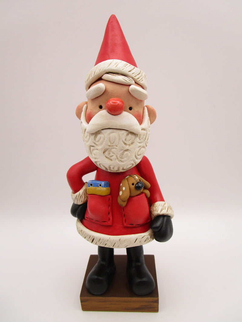 Christmas folk art big Santa Claus with pockets and toys