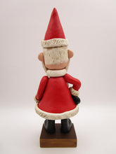 Christmas folk art big Santa Claus with pockets and toys