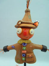 Halloween folk art big scarecrow with crows