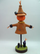 Halloween folk art big scarecrow with crows