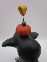 Halloween folk art black bird with pumpkin and heart