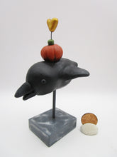 Halloween folk art black bird with pumpkin and heart