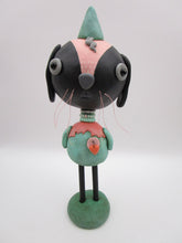 Spring folk art or Easter black bunny retro feel with beads and heart charm