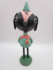 Spring folk art or Easter black bunny retro feel with beads and heart charm