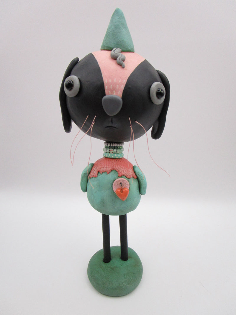 Spring folk art or Easter black bunny retro feel with beads and heart charm