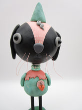 Spring folk art or Easter black bunny retro feel with beads and heart charm