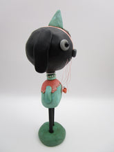 Spring folk art or Easter black bunny retro feel with beads and heart charm