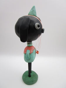 Spring folk art or Easter black bunny retro feel with beads and heart charm