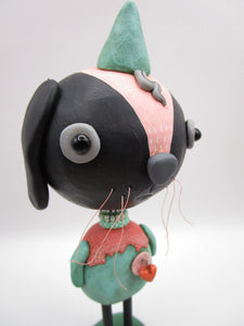 Spring folk art or Easter black bunny retro feel with beads and heart charm