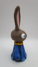 Spring folk art brown bunny wearing flower petal dress bluebell