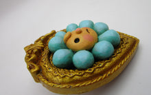 Spring folk art blue flower character in an ornate frame