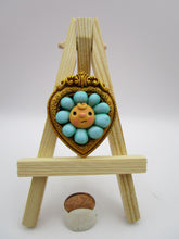 Spring folk art blue flower character in an ornate frame