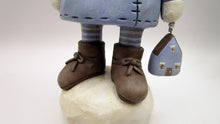 Christmas folk art snowman in sky blue and beanie