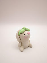 Spring folk art or Valentine little bunny with mint bow