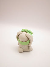 Spring folk art or Valentine little bunny with mint bow