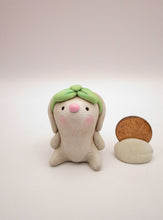 Spring folk art or Valentine little bunny with mint bow