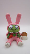 Easter sitting zombie in bunny costume