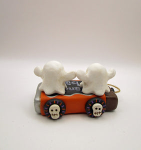 Halloween folk art two ghosts on a "pull" toy candy bar