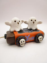 Halloween folk art two ghosts on a "pull" toy candy bar