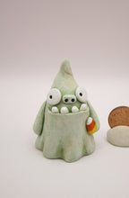 Halloween folk art monster zombie like ghost with candy corn