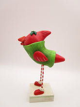 Christmas cardinal bird wearing sweater