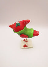 Christmas cardinal bird wearing sweater