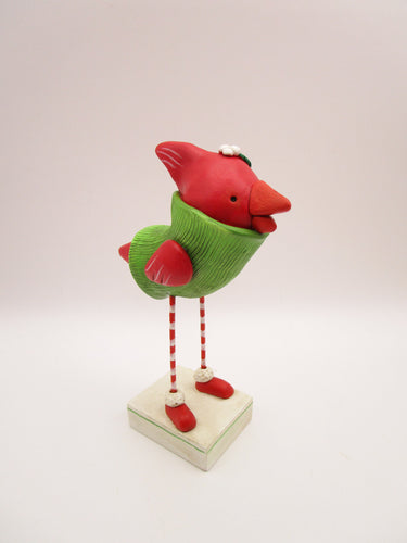 Christmas cardinal bird wearing sweater