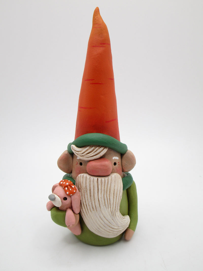 Spring Easter gnome with carrot cap and bunny friend