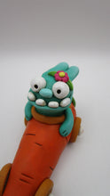 Easter folk art bunny monster riding a carrot car