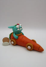 Easter folk art bunny monster riding a carrot car