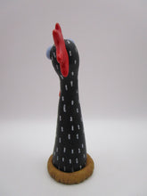 Spring folk art chicken sitting on nest