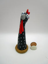 Spring folk art chicken sitting on nest