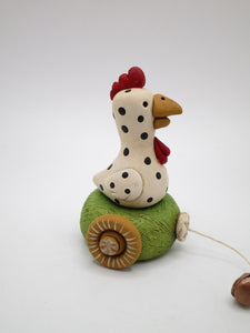 Spring time or Easter small chicken pull toy look